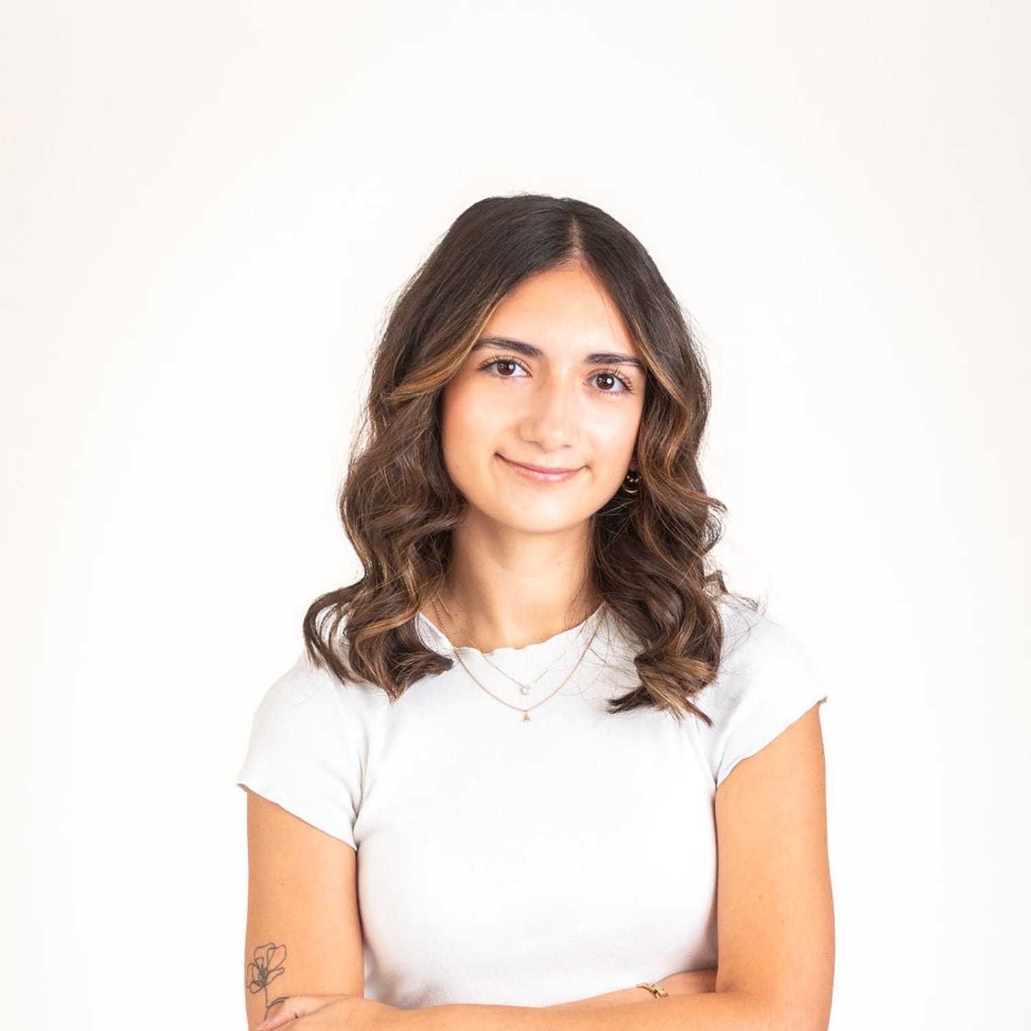 Portrait of Jazmyn, a professional stylist at Cactus Hair Salon, showcasing their expertise and style.